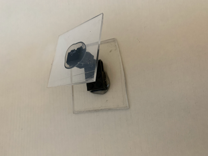 Wall mount with sticky putty